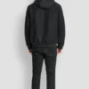 Bomberjacke aus Kunstwolle mit Kapuze und Latzhose Bomberjacke aus Kunstwolle mit Kapuze und Latzhose