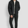 Bomberjacke aus Kunstwolle mit Kapuze und Latzhose Bomberjacke aus Kunstwolle mit Kapuze und Latzhose