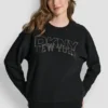 DKNY Sweatshirt mit Rundhalsausschnitt und aufgedrucktem NY-Logo mit Strassverzierung DKNY Sweatshirt mit Rundhalsausschnitt und aufgedrucktem NY-Logo mit Strassverzierung