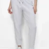 Hoch taillierte, mit Nieten verzierte Slim-Fit-Jogginghose Hoch taillierte, mit Nieten verzierte Slim-Fit-Jogginghose