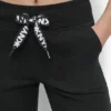 Hoch taillierte, zweifarbige Jogginghose mit Logo und Kordelzug Hoch taillierte, zweifarbige Jogginghose mit Logo und Kordelzug