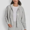 Hoodie mit Reißverschluss und Pailletten Hoodie mit Reißverschluss und Pailletten