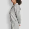 Hoodie mit Reißverschluss und Pailletten Hoodie mit Reißverschluss und Pailletten