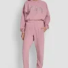 Jogginghose mit hochgeschnittenem Bund, Relaxed Fit und Varisty-Logo aus Strasssteinen Jogginghose mit hochgeschnittenem Bund, Relaxed Fit und Varisty-Logo aus Strasssteinen