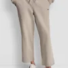 Metallic-Bubble-Logo-Cropped-Hose mit hoher Leibhöhe Metallic-Bubble-Logo-Cropped-Hose mit hoher Leibhöhe