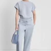 Metallic-Bubble-Logo-Cropped-Hose mit hoher Leibhöhe Metallic-Bubble-Logo-Cropped-Hose mit hoher Leibhöhe