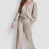 Metallic-Bubble-Logo-Cropped-Hose mit hoher Leibhöhe Metallic-Bubble-Logo-Cropped-Hose mit hoher Leibhöhe
