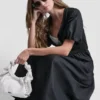 Midi-Kleid im Henley-Stil mit Rippbündchen und Puff-Ärmeln Midi-Kleid im Henley-Stil mit Rippbündchen und Puff-Ärmeln