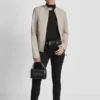Motorradjacke aus Kunstleder mit Druckknopf-Kragen Motorradjacke aus Kunstleder mit Druckknopf-Kragen