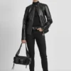 Motorradjacke aus Kunstleder mit Druckknopf-Kragen Motorradjacke aus Kunstleder mit Druckknopf-Kragen