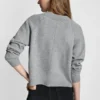 Raglan-Strickjacke mit V-Ausschnitt und edlen Knöpfen Raglan-Strickjacke mit V-Ausschnitt und edlen Knöpfen
