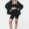 Bomberjacke mit hohem Kragen und Kapuze Bomberjacke mit hohem Kragen und Kapuze