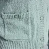 Strickjacke mit Rundhalsausschnitt und aufgesetzten Taschen