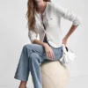 Strickjacke mit Tuck-Stich und Rundhalsausschnitt Strickjacke mit Tuck-Stich und Rundhalsausschnitt